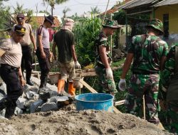 Satgas TMMD Ke 119 Lanjutkan Pembangunan Turap Meski Cuaca Ekstrim
