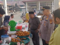 Ciptakan Suasana Aman, Kapolsek XIIII Koto Kampar Tinjau Pasar Takjil di Desa Koto Tuo