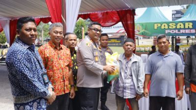 Gelar Gerakan Pangan Murah, Polres Kampar Distribusikan 4 Ton Beras untuk Stabilkan Harga dan Bantu Masyarakat